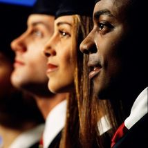 Photo of three graduates