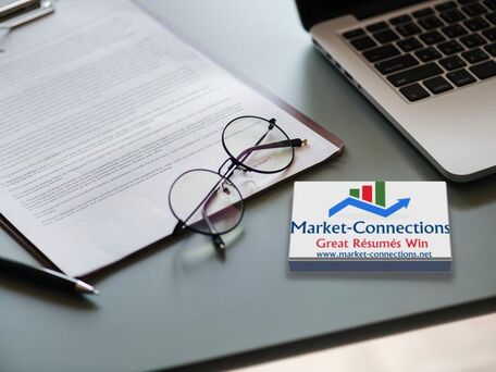 Photo of a laptop, an application, a pen, and a pair of glasses. There is also a logo from https://www.market-connections.net