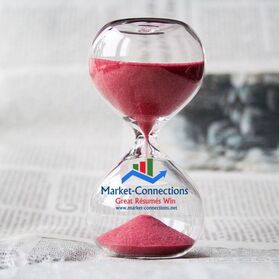 Picture of an hour-glass with a logo of https://www.market-connections.net